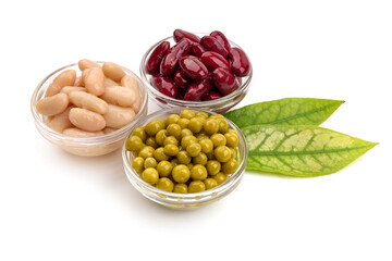 Canned green peas, kidney and navy beans, non-perishable food, isolated on white background. High...