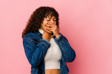 Young african american afro woman isolated suffers pain in throat due a virus or infection.