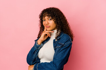 Young african american afro woman isolated unhappy looking in camera with sarcastic expression.