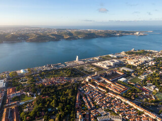 Aerial view of Belem District and Tagus River at sunrise in Lisbon, Portugal.