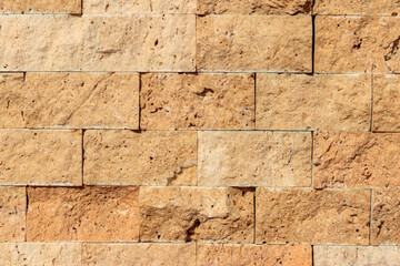 Background of the beige travertine tiles