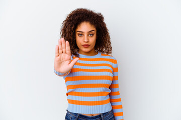 Young african american woman isolated on white background standing with outstretched hand showing...