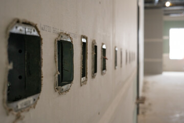 Electrical boxes waiting for finish work