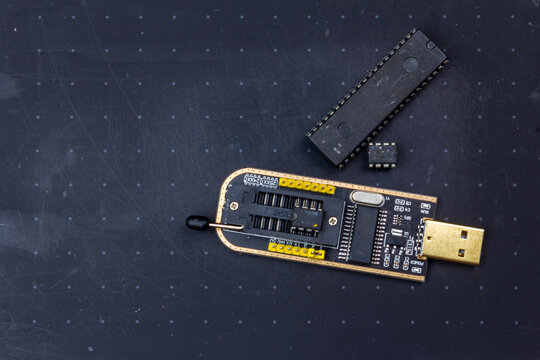 programmer with inserted microchip memory. radio electronics repair