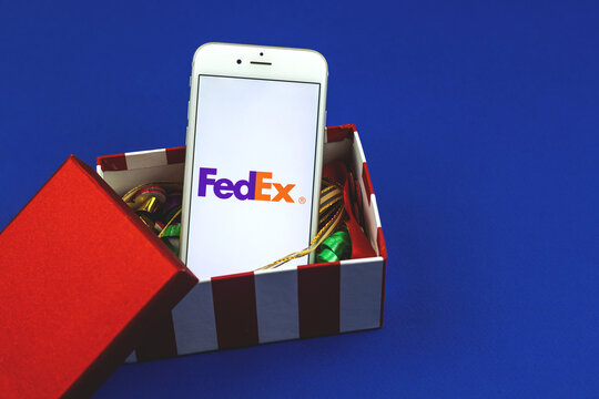 Kharkov, Ukraine - February 22, 2021: FedEx App Logo Of Shipping Company Displayed On Apple Smartphone Screen, Creative Composition, Copy Space