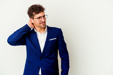Young business caucasian man isolated on white background touching back of head, thinking and making a choice.