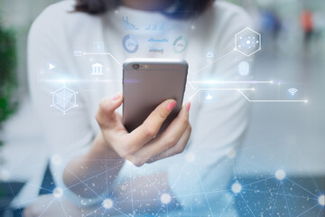 Internet of thing IoT Business network connection concept.Close-up of Woman hands holding mobile...
