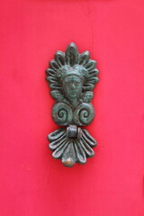Decorated bronze knocker