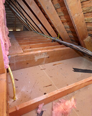 Hidden under the eaves. Cabling runs - electric, gas, ethernet, audio-visual - behind the walls and...