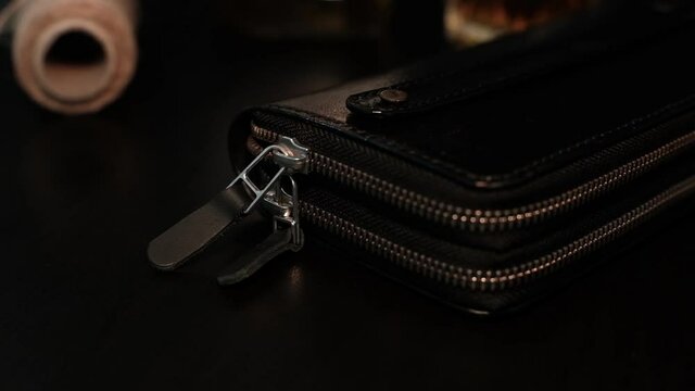 men's leather wallet on a dark background