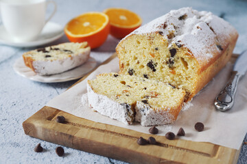 Orange cake with chocolate, powdered sugar dressing