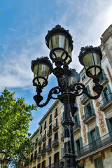 Fototapeta na wymiar Spain, Barcelona. Light along the street.
