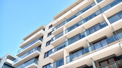 Condominium and apartment building with  symmetrical modern architecture in the city downtown.