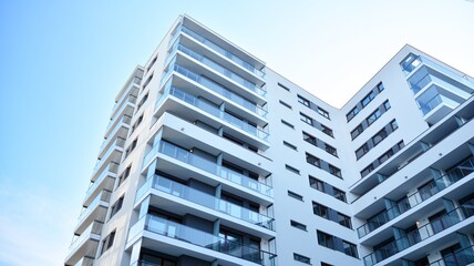 Condominium and apartment building with  symmetrical modern architecture in the city downtown.