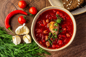 Ukrainian cuisine dishes. Borscht in a clay plate 
