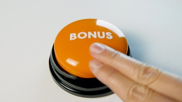 Young woman pushing orange Bonus button to get a prize for free. 4K video for promo banner, special offer, advertising. Cash incentive, financial compensation.  Rewarding perfect performance