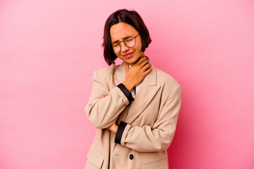 Young business mixed race woman isolated on pink background suffers pain in throat due a virus or infection.