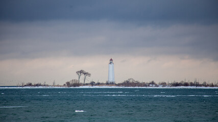 Obraz premium The Nottawasaga lighthouse is in southern Georgian Bay, Collingwood, and is in need of rebuilding to keep the structure stable. The lighthouse was a beacon for the town's shipbuilding history