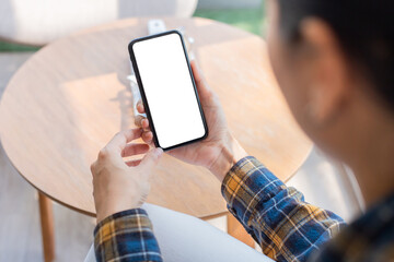 cell phone blank white screen mockup.woman hand holding texting using mobile on desk at office.background empty space for advertise.work people contact marketing business,technology