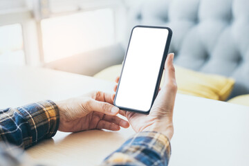 cell phone blank white screen mockup.woman hand holding texting using mobile on desk at office.background empty space for advertise.work people contact marketing business,technology