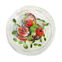 Baked eggplant with tomatoes, cheese and basil in plate isolated on white, top view
