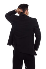 Businessman in formal suit on white background, back view