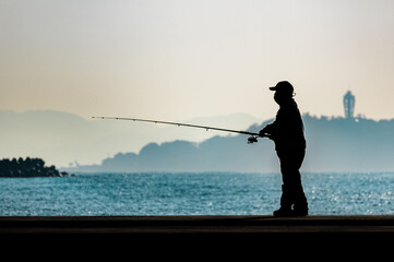 fishing at sunset