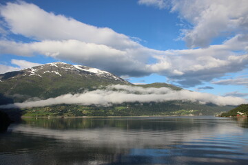 Naklejka na ściany i meble Reflections in the Norwegian Fjords.