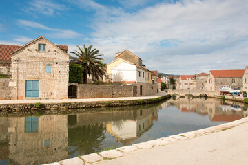 Fototapeta na wymiar Croatia, Hvar Island, Vrboska. Known as Little Venice for its canals and bridges.