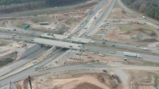 Highway construction of interchange and moving traffic 