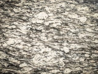 Details of the surface, a close-up shot, with a vignette on the cover and a bright dot in the center. Background or backdrop ideas.