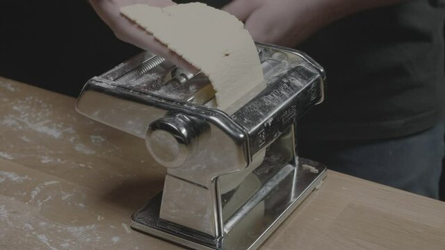 High angle of dough in a pasta maker
