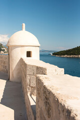 Fototapeta na wymiar Croatia, Dubrovnik. Lookout turret tower on wall.