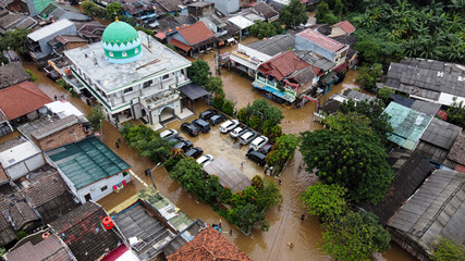 Aerial POV view Depiction of flooding. devastation wrought after massive natural disasters. BEKASI,...