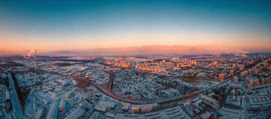 rising sun illuminates the beautiful home town shackled by frost