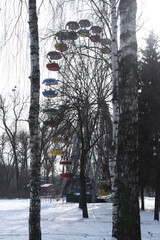 Ferris wheel attraction in the small Ukrainian town  Sumy in winter