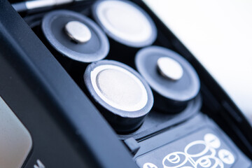 The concept of replacing batteries while traveling. AA batteries.