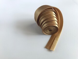 folded bias tapes on white background