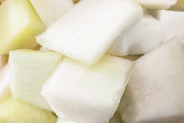 Sweet cut melon as background
