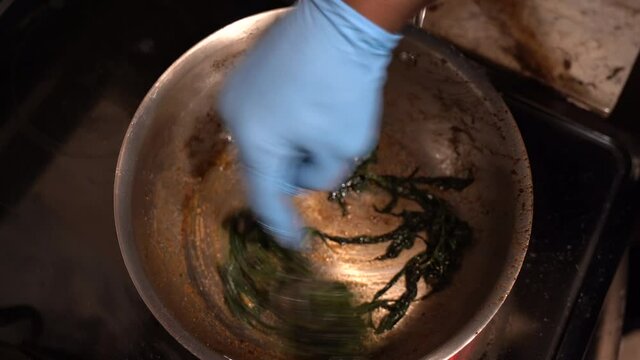 Marinated Saut&eacute;ed
Cannabis Leafs simmering.