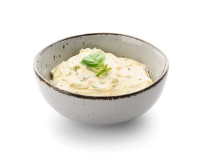 Bowl with tasty garlic butter on white background