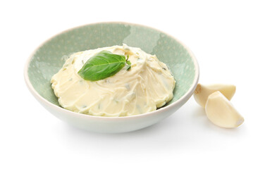 Bowl with tasty garlic butter on white background