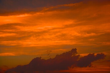 impression clouds. from golden hour sky. texture background with copy space. Vivid tone・soft focus image.