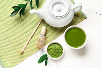 Composition with matcha tea on light background
