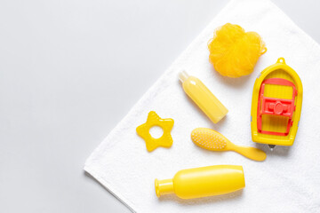 Set of bath accessories for baby on light background