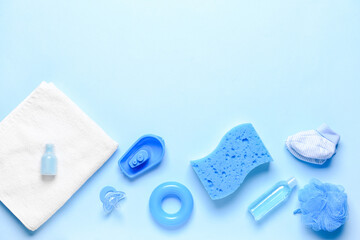 Set of bath accessories for baby on color background