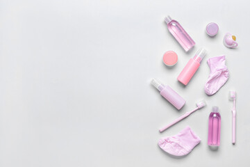 Set of bath accessories for baby on light background