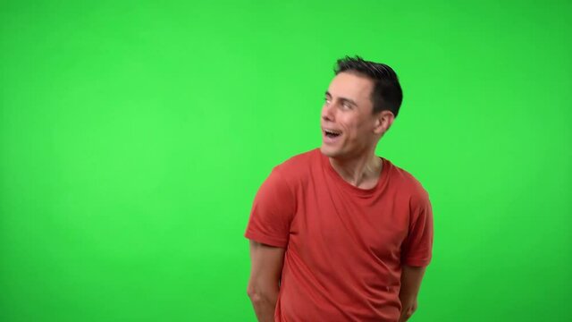 Silly man doing nonsense. Chroma green background.
