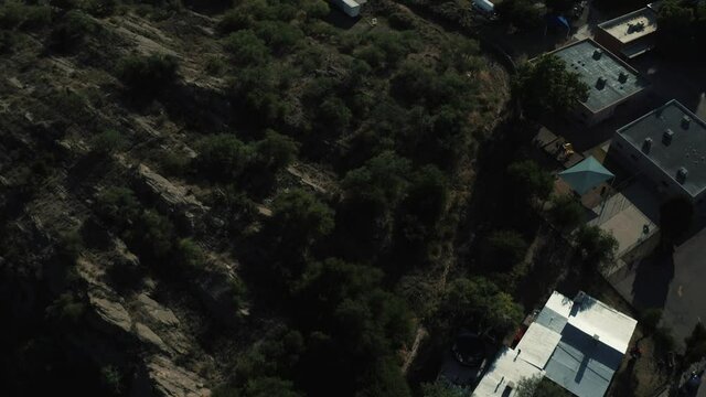 Aerial view of border city Nogales separating the United States of America and Mexico on a bright an sunny day with a drone
