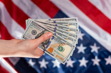 American dollars bank notes in female hands